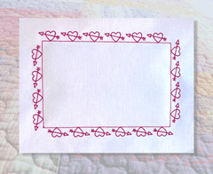 Hearts and Arrows in the hoop border embroidery design for quilt labels