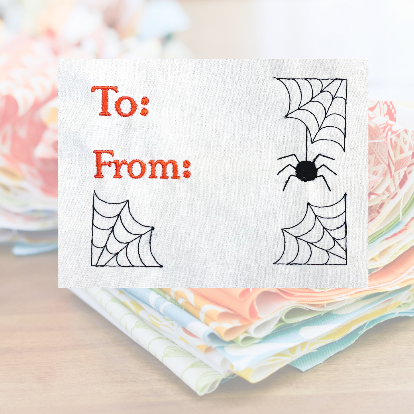 Spiderweb quilt label embroidery design